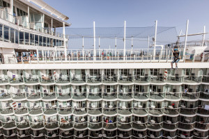 Royal Caribbean, Harmony of the Seas, zip lines take guests on an exhilarating ride across an open-air atrium suspended nine decks high above Boardwalk – a distance of more than 82 feet (25 meters).