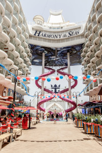 Royal Caribbean, Harmony of the Seas, Seas is the Ultimate Abyss, the tallest slide on the high seas, which will intimidate the bravest of guests and challenge them to prove their courage. Towering more than 150 feet above sea level, overlooking the AquaTheater at the aft of the ship, Boardwalk